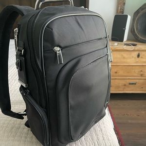 Tumi Arrive Bag brand new (paid 595$) great bag for travel /business laptop etc
